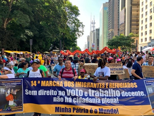 PROTESTO DOS IMIGRANTES POR MELHORES CONDIÇÕES DE VIDA
